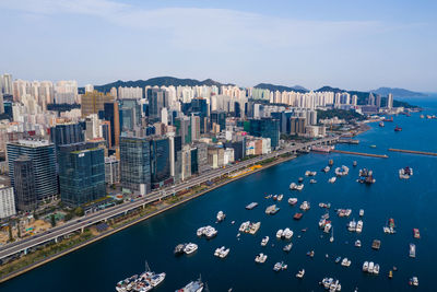 High angle view of city buildings at waterfront