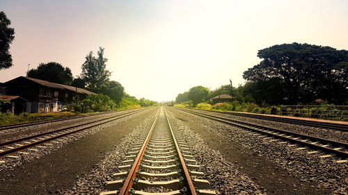 View of railroad tracks against clear sky