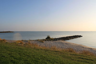Scenic view of sea against clear sky