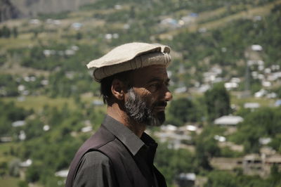 Portrait of man wearing hat outdoors