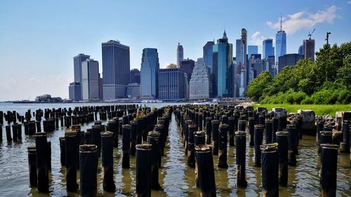 Panoramic view of modern buildings in city against sky