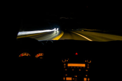 Car on road at night