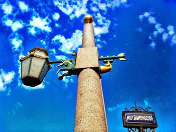 Low angle view of building against blue sky