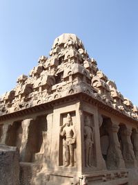 Low angle view of statue against sky