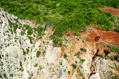 High angle view of people walking on mountain