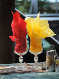 Close-up of ice cream on glass table