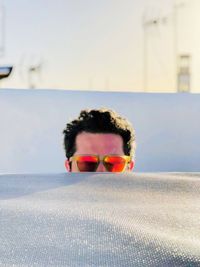 Portrait of mature man wearing sunglasses