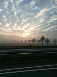 Scenic view of landscape against sky during sunset