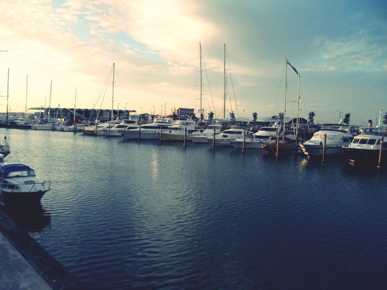 nautical vessel, moored, transportation, water, mode of transport, boat, sky, harbor, sea, mast, cloud - sky, waterfront, sailboat, marina, sunset, cloud, reflection, cloudy, nature, outdoors