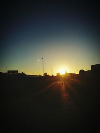 Empty road at sunset