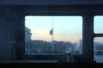 Close-up of bus glass window