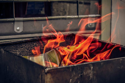 Close-up of fire in metal container