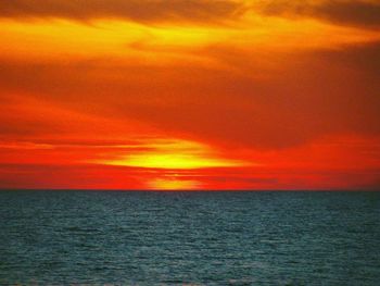 View of calm sea at sunset