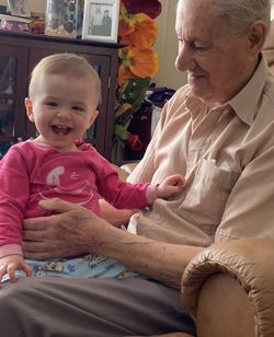 Cute baby girl sitting on stage