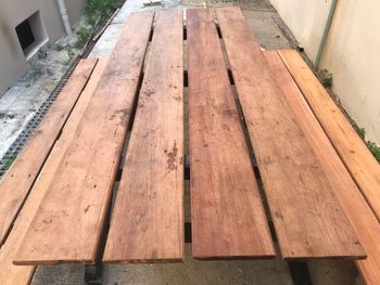 High angle view of wooden bench