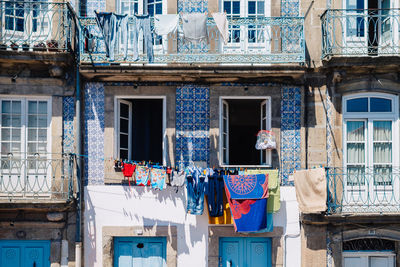 Clothes hanging on clothesline outside building