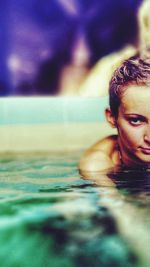 Woman swimming in pool