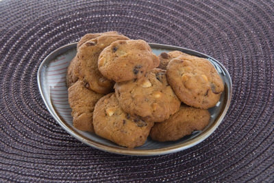 High angle view of cookies in plate