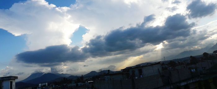 Low angle view of houses against sky