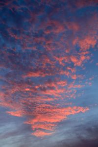 Low angle view of dramatic sky during sunset