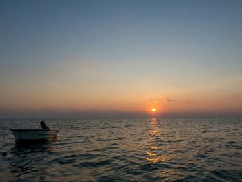 Scenic view of sea at sunset