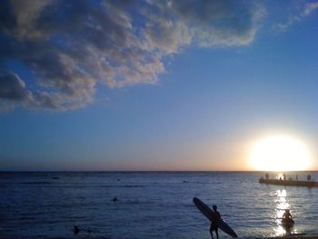 Scenic view of sea at sunset