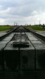 Metallic structure against sky