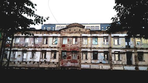 Building with trees in background