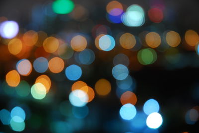 Defocused image of colorful illuminated lights at night