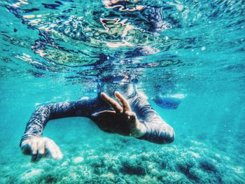 Man swimming in pool