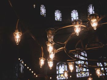 Low angle view of illuminated chandelier