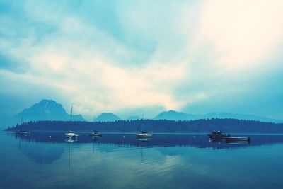 Scenic view of sea against cloudy sky