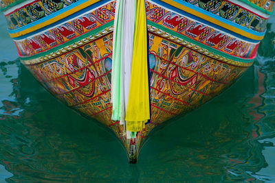 Close-up of multi colored boat in water