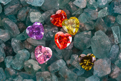 High angle view of multi colored pebbles on rock