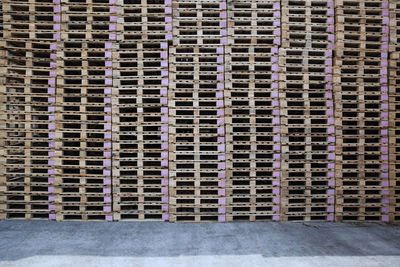 Stacks of pallets on factory yard