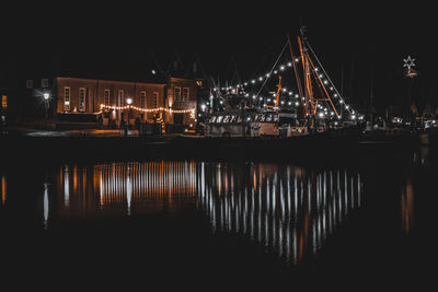 Illuminated commercial dock at night