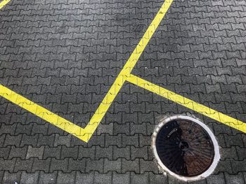High angle view of yellow markings on street