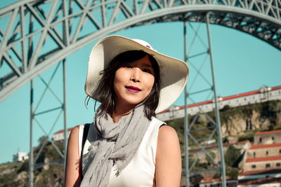 Portrait of smiling woman wearing hat
