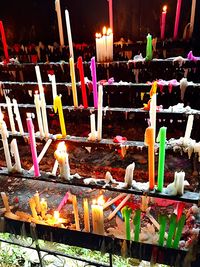 Multi colored lanterns for sale at night