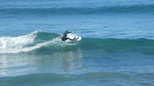 Man swimming in sea