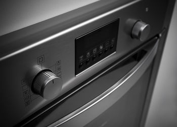 Close-up of oven in kitchen