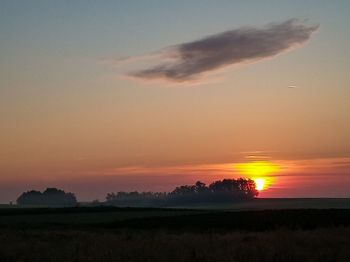 Scenic view of silhouette landscape against sky during sunset