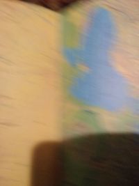 Defocused image of field against sky