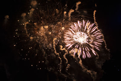 Firework display at night