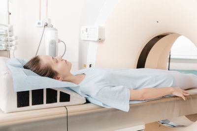 Medical ct or mri scan with a patient in the modern hospital laboratory. interior of radiography 