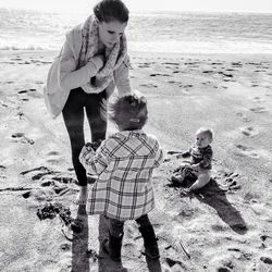 Full length of child on sand at beach