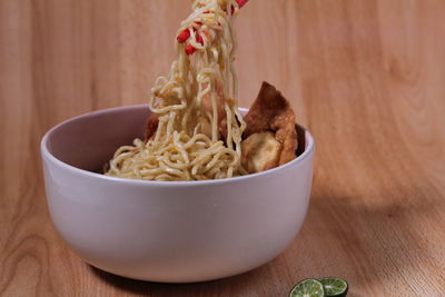 Close-up of rice in bowl on table