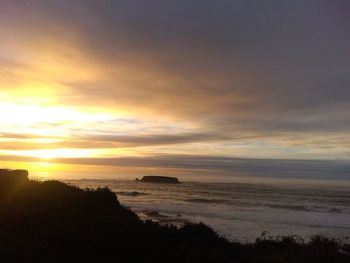 Scenic view of sea against sky during sunset