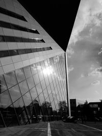 Low angle view of illuminated buildings against sky
