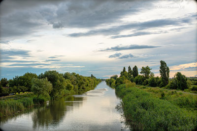 Scenic view of river against sky